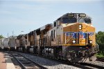 Sand train cruises west through the station